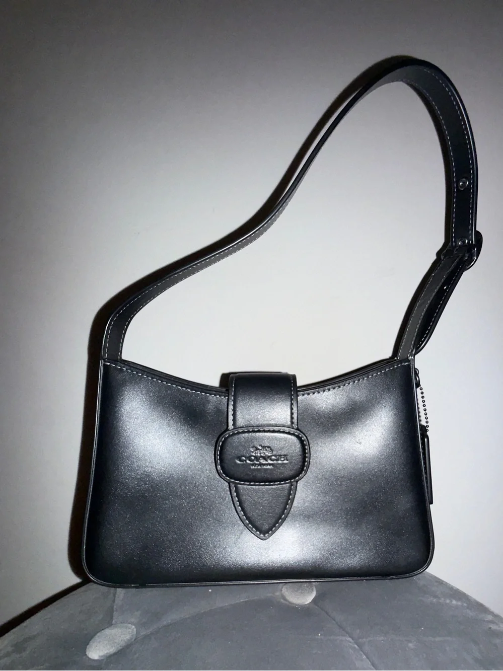Coach “Eliza” Black Leather Shoulder Bag with Tab Closure